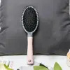 Peine para rizar el cabello para el hogar, para hombres y mujeres, con cojín de aire, masajeador, peine de hueso en forma de fila, lindo peine cilíndrico con hebilla interior.