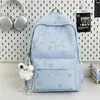 Mochila de estilo minimalista de alta gama con estampado de estrellas en tonos oscuros, refrescante y juvenil estilo americano, adecuada para estudiantes para la escuela y salidas, mochila escolar moderna y genial