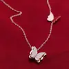 Explosiones Europeas y Americanas Venta al por Mayor Acero Inoxidable Colgante de Mariposa Collar Pendientes traje Cadena para Clavícula Elegante Celebridad de Internet Joyería Sencilla