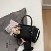 Bolsos populares para mujer de este año 2026 principios de primavera nuevo bolso cruzado casual versátil bolso de mano súper popular bolso cubo bolso tote pequeño