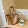 Bolsa de lona de gran capacidad para mujer, nuevo modelo 2026, bolso casual simple de hombro o axila para ir al trabajo