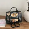 Nova Bolsa Transversal de Urso Estilosa 2026, Mochila de Design de Nicho Versátil e Fashion, Mochila Multifuncional na Moda
