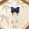 Nuevo pasador de mariposa bordado estilo chino con borla para mujer, accesorio estilo vintage con sensación de alta gama, pinza lateral para Hanfu y cheongsam, al por mayor