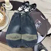 Jeans Masculino Outono 2026 Estilo Coreano Versátil Calça Longa Patchwork Jeans Lavado Calça Casual Cartoon Tendência