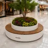 Combinación de maceta redonda para flores y maceta para árboles con asientos para paisajismo interior en centros comerciales, jardineras para plazas y parques, asientos junto a árboles, jardineras con plantas verdes