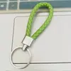 Llavero de cuerda de cuero trenzado simple creativo colgante de muñeca linda accesorios de llave para parejas tendencia regalos pequeños venta al por mayor