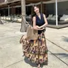 Conjunto Retro de Chaleco de Mezclilla con Cuello en V y Falda Estampada Estilo Resort Único para Mujer, Nuevo Conjunto Verano 2026
