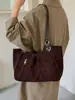 Bolso de mano vintage de gamuza estilo coreano para mujer, nuevo y moderno para otoño e invierno 2026, bolso de hombro de alta gama de gran capacidad para el trabajo