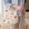Bolsa para huevos al por mayor estampado de dibujos animados bolso de mano portátil para salir bolsa de lona para la mano bolso de muñeca para mujer una generación de pelo