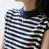 Camiseta de Algodão e Linho Listrada de Manga Curta para Mulheres Verão 2026 Novo Estilo Cor de Algodão Blocos de Cor Listrada Preto e Branco Caimento Solto Emagrecimento e Rejuvenescedora