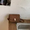 Bolsa pequena texturizada transfronteiriça para mulheres, nova moda 2026, bolsa de ombro versátil, bolsa vintage feminina, bolsa quadrada pequena transversal casual
