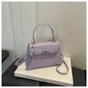 Bolso bandolera con una textura de moda y diseño sencillo, diseño de nicho para el verano 2026, bolso de hombro casual, nuevo bolso cuadrado pequeño para mujer