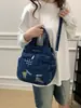 Bolso de Hombro de Moda Transfronterizo 2026 Modelo Nuevo Bolso Cruzado Versátil de Gran Capacidad Mochila Bolso de Mano para Estudiante Viajero