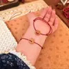 Pulsera de Madera de Melocotón con Hueso de Melocotón y Cuerda Roja Color Manzana para Adultos y Niños del Año Zodiacal Pulsera Anti-Mal de Ojo para Hombres y Mujeres