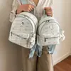Mochila estilo coreano, versátil, ligera, de gran capacidad, adecuada para ir al trabajo, mochila de mujer moderna y elegante, nuevo modelo casual 2026