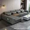 Sofá de cuero gris oscuro de lujo ligero estilo italiano con ribete naranja, respaldo segmentado y chaise longue para sala de estar del hogar
