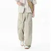 Pantalones anchos deconstruidos con efecto desgastado, pantalones rectos de pierna ancha de moda con múltiples bolsillos hasta el suelo, pantalones de trabajo retro americanos, estilo urbano holgado para hombre