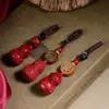Venta al por mayor del fabricante Llavero de Cinabrio Colgante de Calabaza Llavero de Coche Sándalo Escritura Bajo Contenido Llavero de Calabaza