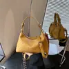 Bolsa de bolinho coreana de nicho transfronteiriça para mulheres, novo modelo 2026, bolsa de ombro e transversal super popular para o dia a dia