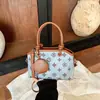 Bolso retro de alta gama para mujer 2026 nuevo estilo bolso de hombro único para el día a día bolso cruzado versátil bolso tipo concha de gran capacidad