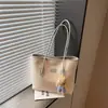 Moda Transfronteriza Versátil y Exquisita Verano 2026 Nuevo Bolso Tote de Hombro Único de Alto Nivel de Diseño de Nicho para Viajes Diarios
