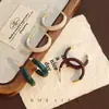 Pendientes de Cuero de Aguja Plateada Geométricos de Gama Alta Círculo Moda Simples Versátiles Pendientes de Nicho Elegantes Exagerados para Mujer