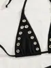 2026 nuevo ins nicho francés europeo y americano sexy anillo de metal deseo puro cuello halter chica retro traje de baño bikini
