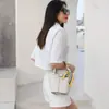 Camada Superior de Textura Avançada Couro Bovino Moda Verão 2025 Novo Estilo Bolsa Transversal Centenas de Estilos Bolsa de Balde Portátil de Nicho da Moda