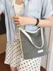Bolsa de balde trançada estilo vintage transfronteiriça para mulheres, nova moda de verão 2026, bolsa de mão versátil, bolsa de ombro, bolsa transversal