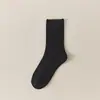 Nuevos calcetines de otoño e invierno para mujer, calcetines de color liso hasta la mitad de la pantorrilla, calcetines largos versátiles de color liso, calcetines acanalados de algodón ligeramente compresivos para mujer