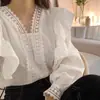Camisa elegante de estilo francés de Corea del Sur con encaje, cuello en V, costuras, volantes, holgada e informal, con mangas abullonadas