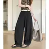 Foto real de los nuevos pantalones casuales de corte holgado adelgazantes de principios de otoño de 2026, pantalones elegantes de tiro alto cropped, pantalones de traje para mujer 16172