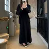 Conjunto de tres piezas para mujer de alta gama, suave y elegante, de corte slim, para otoño e invierno, transfronterizo europeo y americano, con camisola, cárdigan y top de manga larga
