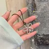 Collar Ajustable con Cuerda Negra y Flor Hueca Estilo Coreano para Mujer, Accesorio de Cadena para Clavícula de Lujo Ligero de Nicho de Alta Gama, Dulce y Fresco