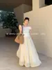 Xiu Xixi 2026 Primavera Nueva Etiqueta Blanca Elegante Falda Larga Plisada de Cintura Alta Estilo Francés para Mujer 85378