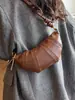 Bolso croissant vintage de nicho 2026 verano nuevo estilo ins para el trabajo bolso de hombro para teléfono bolso cruzado bolso de albóndiga moderno
