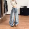 Carpa marea en stock estilo corte retro hebilla de metal jeans mujer nuevo suelto corte curvo pierna ancha caída pantalones largos hasta el suelo