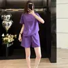 Conjunto de dos piezas morado de estilo deportivo casual para mujer, verano 2026, de manga corta y shorts, holgado y moderno, conjunto para correr que rejuvenece