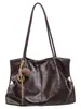 Bolso de axila retro de alta gama de gran capacidad para mujer, nuevo bolso de hombro de moda 2026 para commuting, bolso de mano tipo tote, moderno