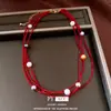 Collar transfronterizo de cuentas de vidrio redondas multicapa y perlas, cadena para la clavícula de lujo ligero de nicho, accesorio de moda estilo vintage