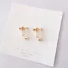 Qingdao Jewelry brincos para conversor de clipe de orelha simples espiral sem furo na orelha clip de orelha em forma de U acessórios fabricantes atacado