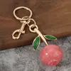 Pingente de bolsa de fruta romã, chaveiro moderno mais vendido, acessório para bolsa, presente criativo para mulheres, decoração de carro