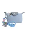 Mini Bolsa de Nylon para Empanadas 2026 Nuevo Modelo Bolsa para Audífonos Bloques de Color Compacta para Monedas y Llaves Bolso Cuadrado Pequeño de Moda