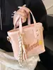 Venta al por mayor popular nicho personalidad impresión de letras bolsa de cubo portátil moda alta textura bandolera para ir al trabajo mujeres