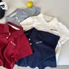 Polo Infantil Algodón Clase Dos 2026 Producto Nuevo Verano Niños y Niñas Color Sólido Polo Bordado Bebé Cuello Camisero Manga Corta