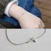 Suministro directo de fábrica 2025 nuevo brazalete cruzado de lujo ligero para mujer, diseño de nicho, joyería estilo vacacional, en stock para venta al por mayor