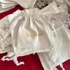 Bolsa de Tecido Grosso de Algodão e Linho Off-White com Cordão Estilo Marca de Luxo Personalizada, Vendida Quente, com Logo Estampado em Ouro para Joias e Sacolas de Presente