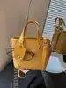 2026 popular nuevo bolso de hombro cruzado con textura de moda, bolso de mano tipo cubo vintage de gran capacidad con textura para mujer