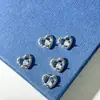 Nuevos Accesorios para Uñas Zircón Súper Brillante Corazón Diamante de Cristal Lujo Ligero Versátil Flor Hueca Trébol Decoración de Uñas Fabricante