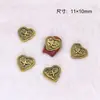 Acessórios de Nail Art em Liga Desenho Animado Urso Rosto Sorridente Coração Torto Diamante Textura Tridimensional Retrô Decoração de Unha Fabricante Entrega Direta